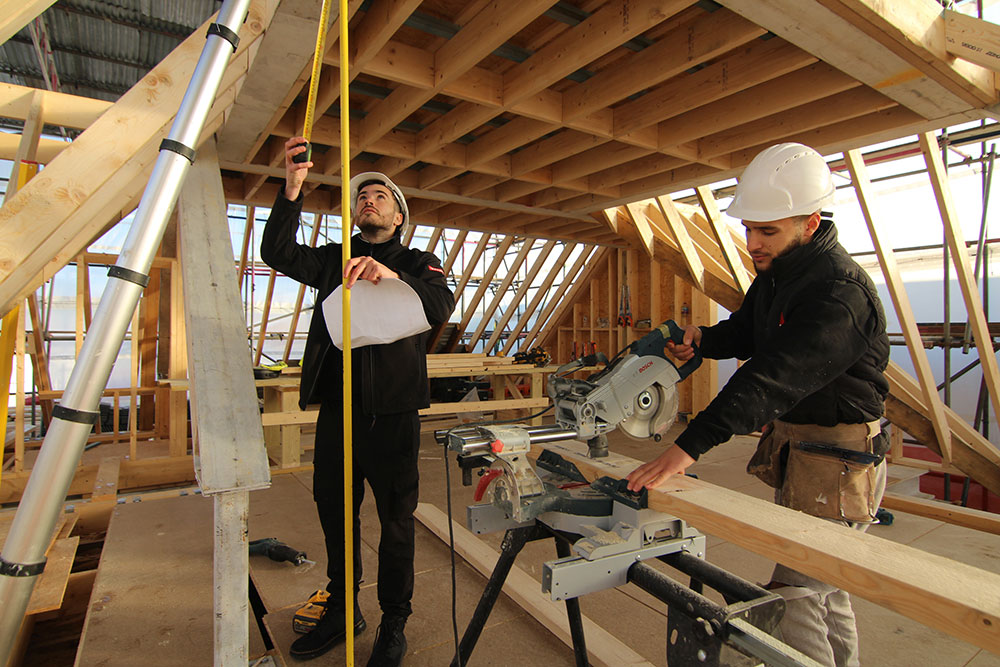 TLC workers on site inside new roof structure
